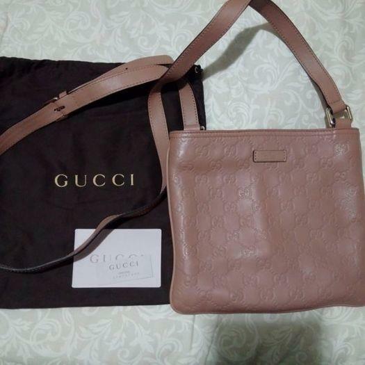 Authentic Gucci Leather slingbag in EXCELLENT condition at S$350